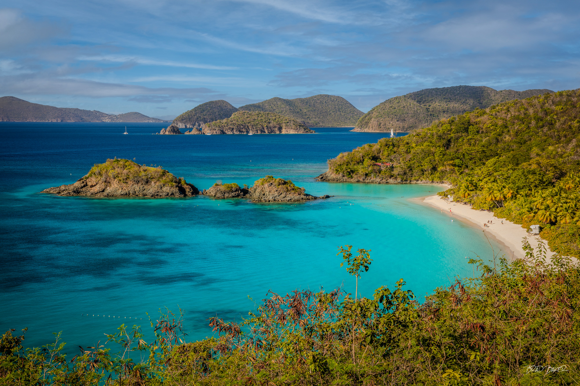 ST JOHN VISTA Panoramic aerial view of Trunk Bay's iconic curved white sand beach and brilliant turquoise waters, St. John USVI.